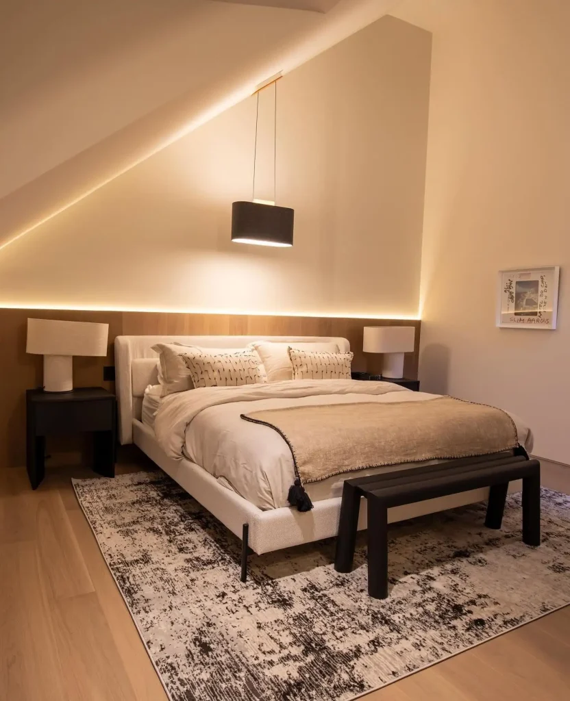 Highlight with Strategic Lighting inslanted bedroom